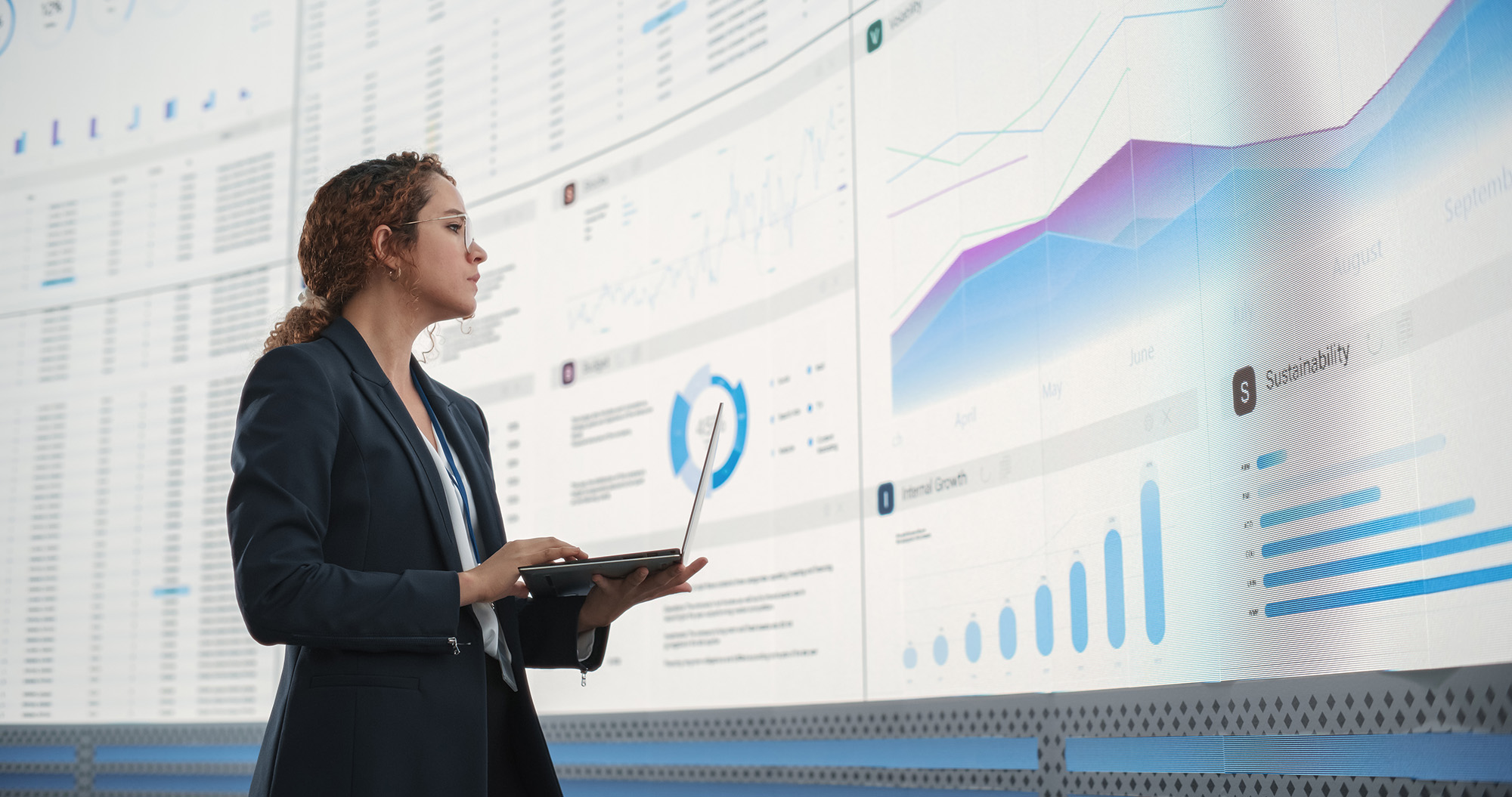 person presenting on a large screen